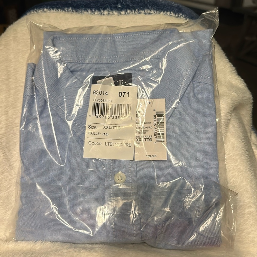 The Children’s Place boy’s XXL/16 light blue Oxford button down shirt. New w tag